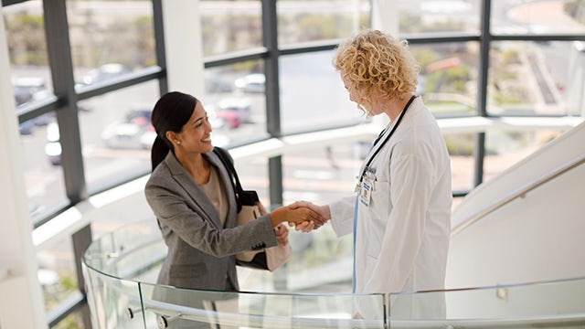 04ce4178-2a68-4957-8e19-d591867fcbee - financial-services-healthcare-handshake-stairs-feature-640x360
