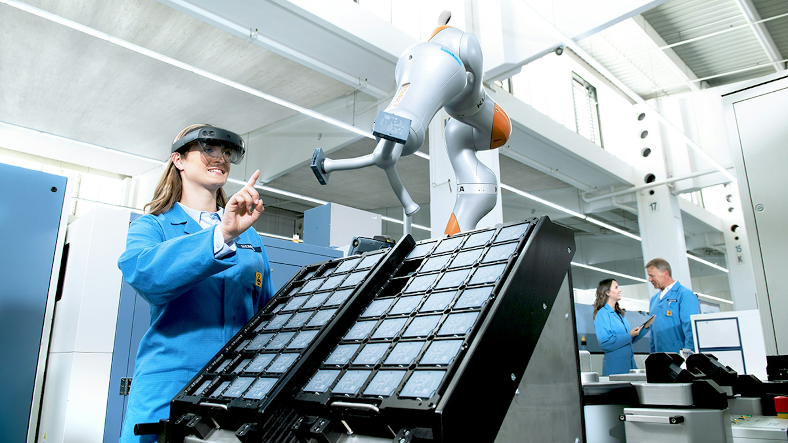 A factory with multiple machines and conveyor belts in operation.