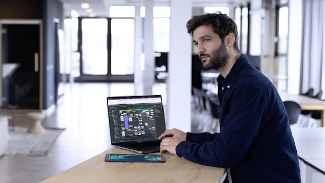 A Siemens product image featuring a computer monitor displaying a user interface with various icons and text.