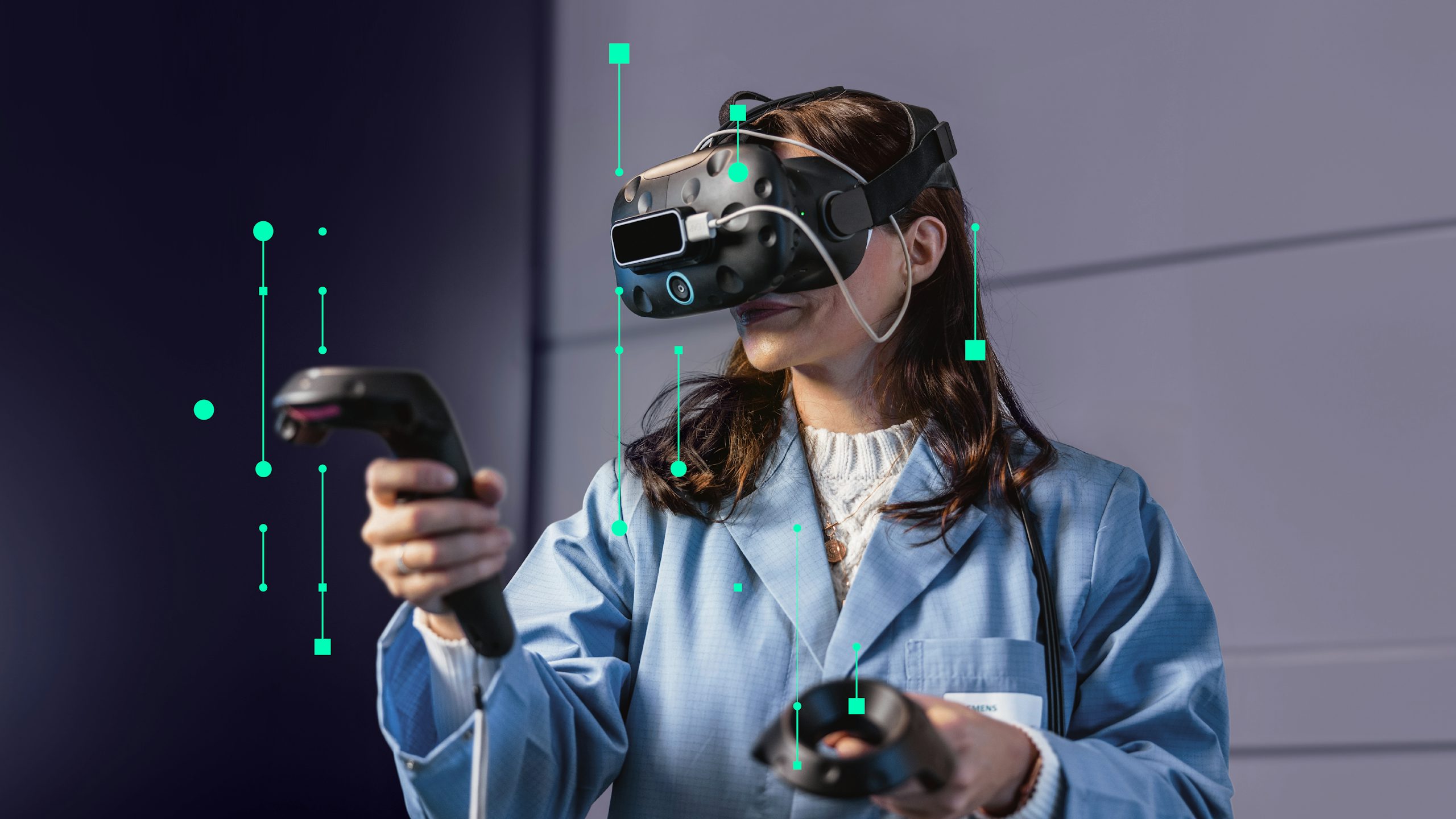 A woman in a lab coat wears a VR headset and holds controllers, with green data visualization overlays, indicating virtual reality interaction.