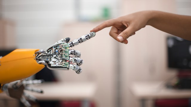 Image a human finger touching a robot finger.
