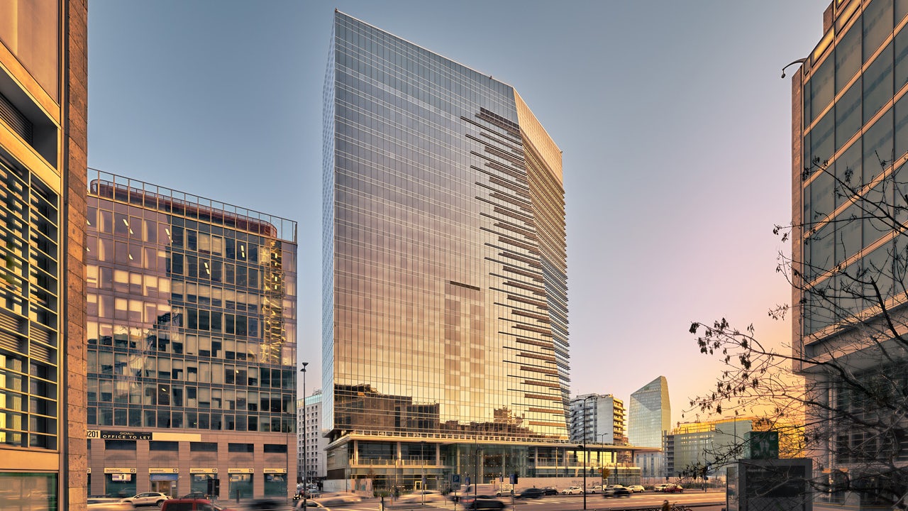 View of the Coima Gioia22 building from the front at sunrise or sunset