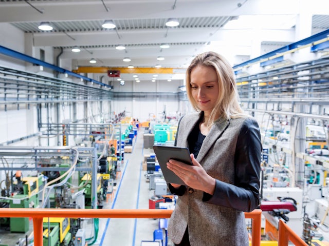 A factory floor with machinery and equipment in an industrial setting.