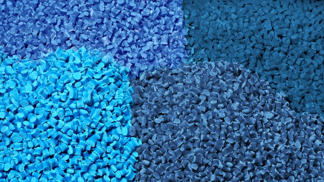 Plastic bottles and containers floating in water, with a hand reaching out from below the surface