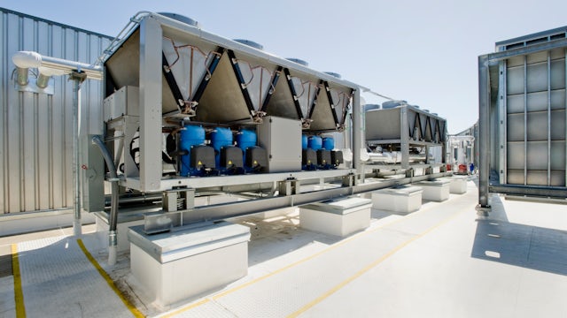 An outdoor chrome chiller plant on a sunny day.