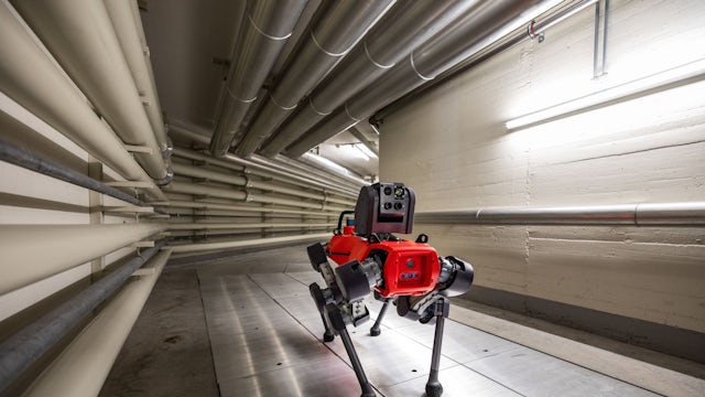 A robot is going to an inspection mission, possibly in a factory or industrial setting. 