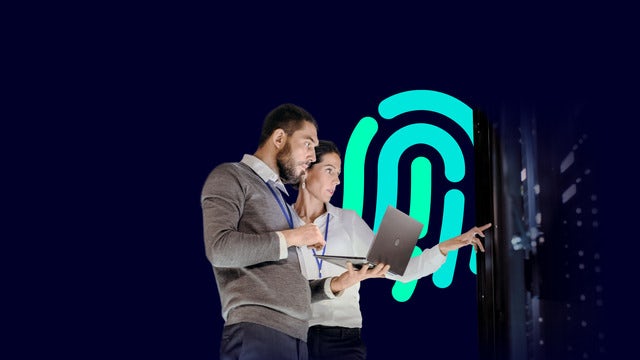 Two cybersecurity specialists reviewing data on a laptop and interacting with a server rack, with a large digital fingerprint icon in the background symbolizing secure identity and network protection.