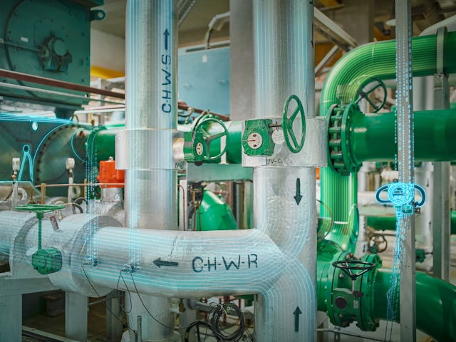 An image of a Siemens HVAC system optimization with a chiller and a graph showing energy savings. 