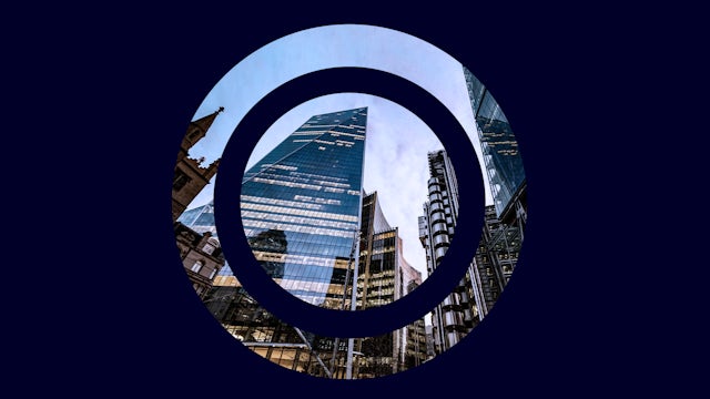 Dark blue background with circular target cut out, through which is an image of skyscrapers against a blue sky.