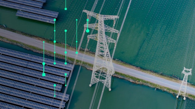 An energy‑generation site with power lines, transmission towers, and a nearby solar field on the water, intersected by a small road, overlaid with a digital visualization layer. From the GWS campaign.