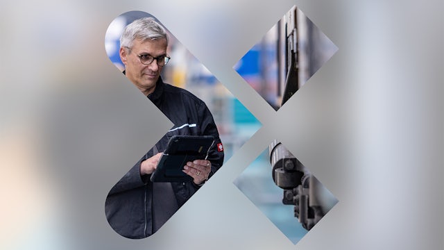 Employee using a device with logo overlay.