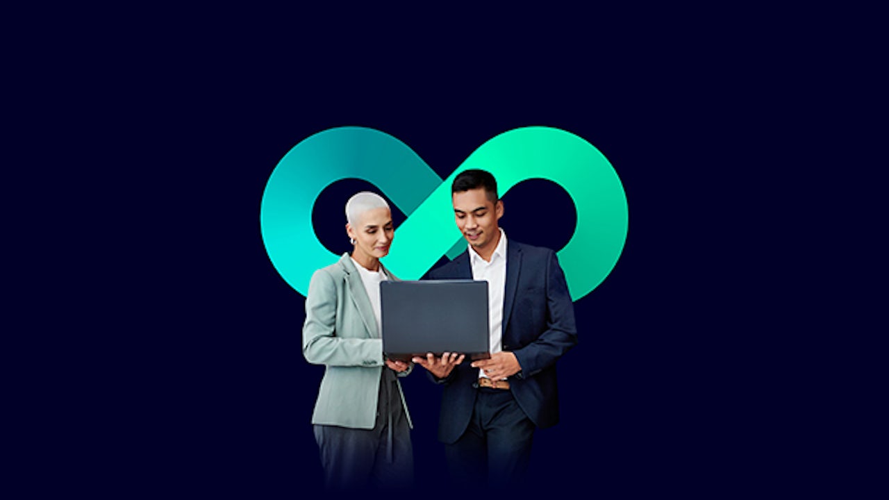 A group of people in a meeting with a large screen in the background displaying a partner ecosystem.