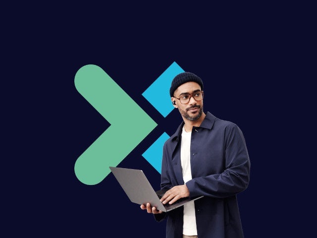 Man holding a computer.