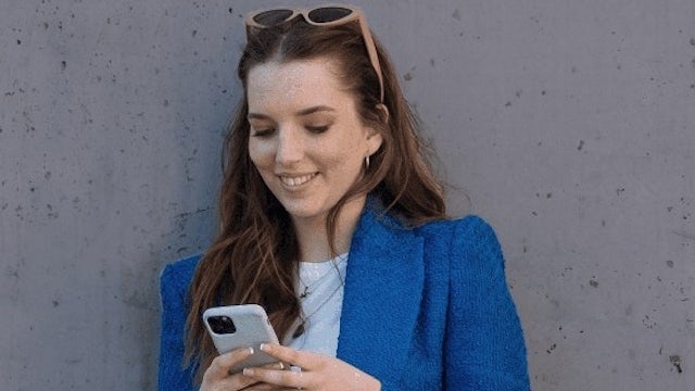 Woman on a mobile device next to an exploded rendering of mobile phone.