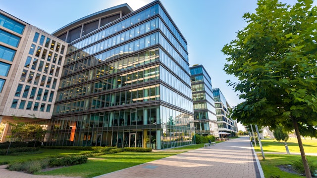 Image of modern office building with trees