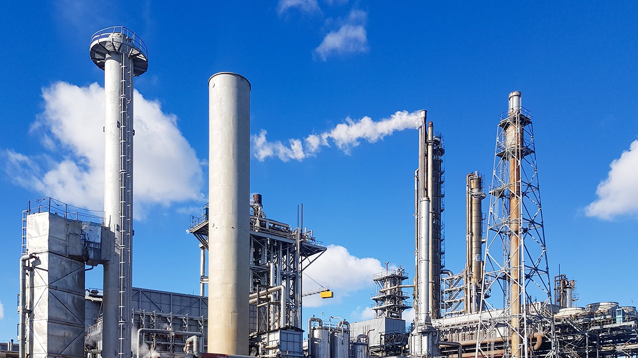 A fertilizer production factory with machinery and equipment in operation.