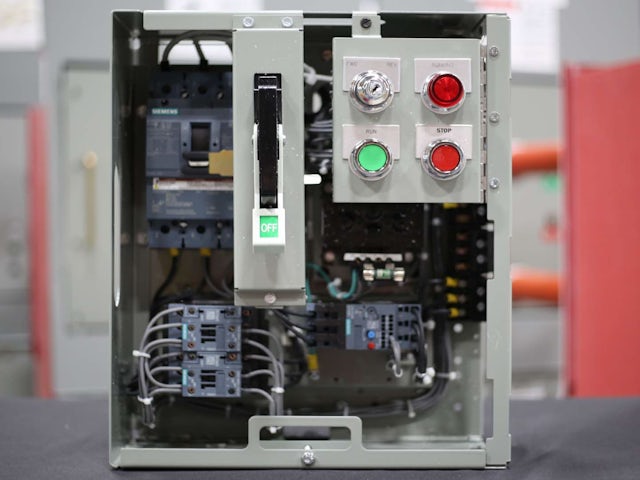 A Siemens MCC bucket is shown in a warehouse setting. 
