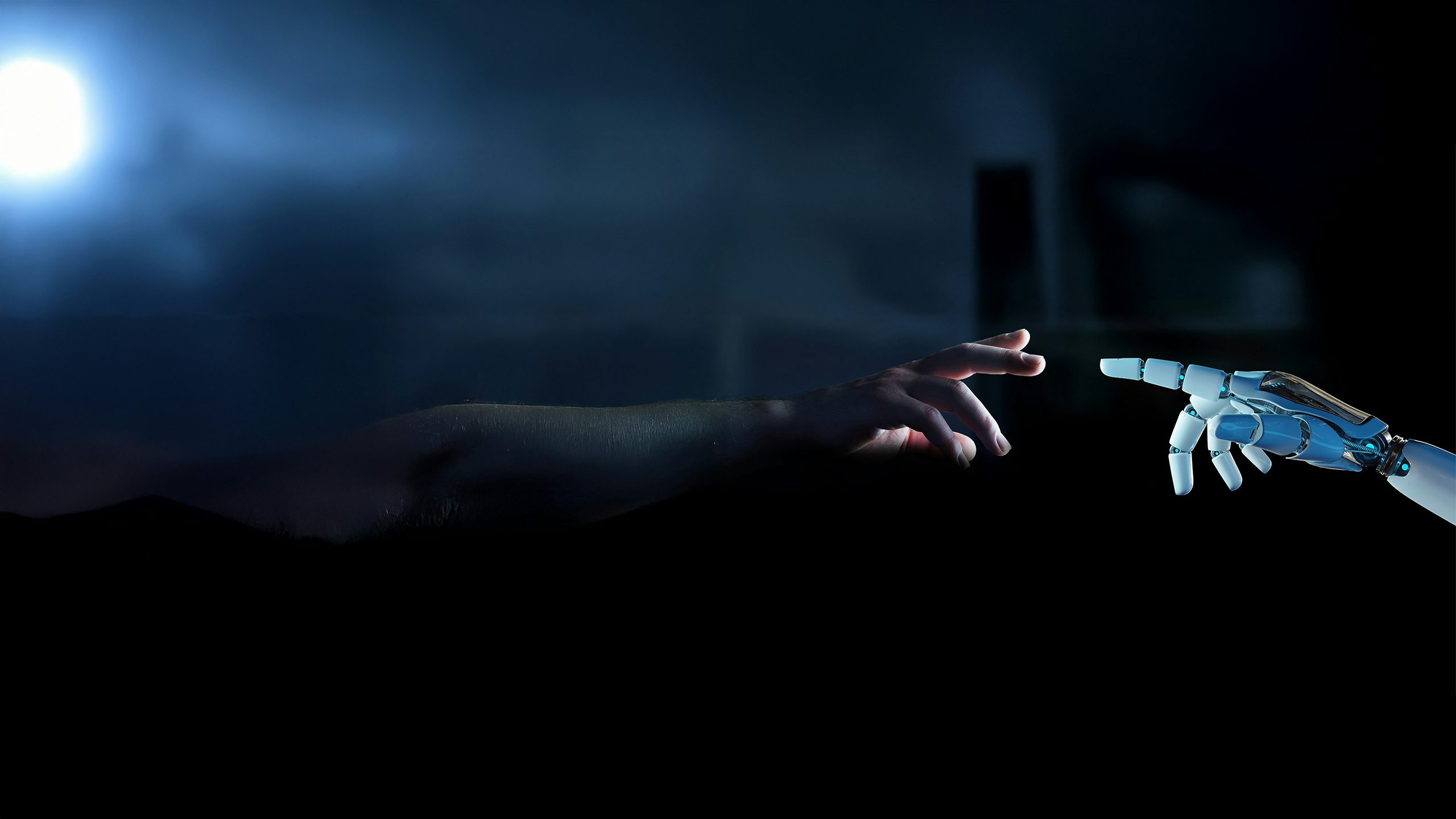 Human hand reaching toward a white robotic finger, about to make contact.