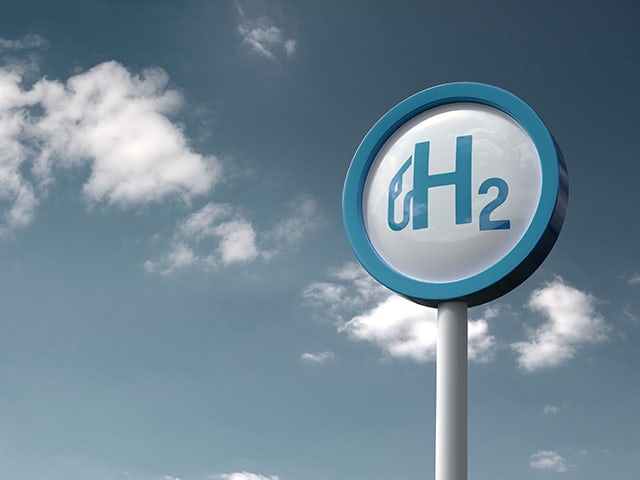 A sign with the word "Hydrogen" in white font on a blue background.