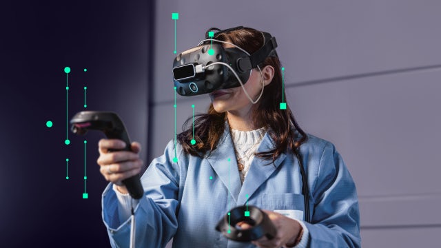 A designer uses a VR headset to interact with a generative design simulation