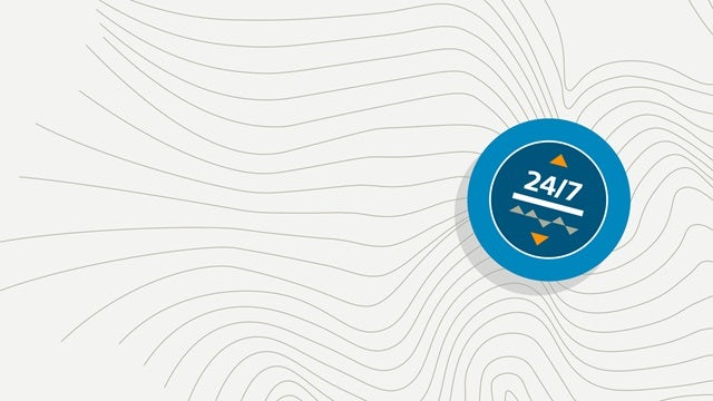 Image of a compass showing 24/7.