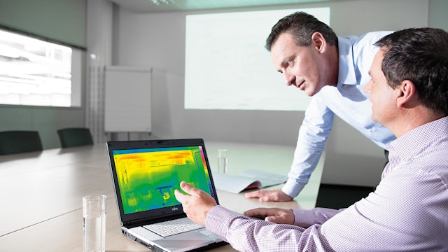 A control panel with a digital display showing temperature rise verification.