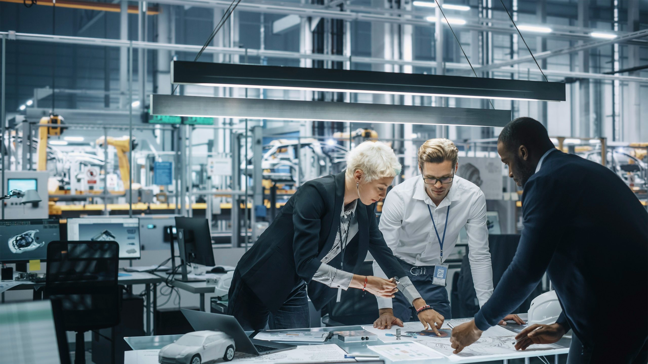 Manufacturing professionals collaborating.
