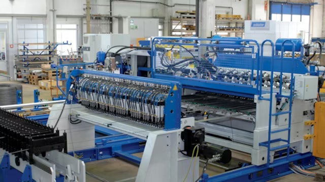 A seamless change management process with a person holding a hand over a gear wheel.