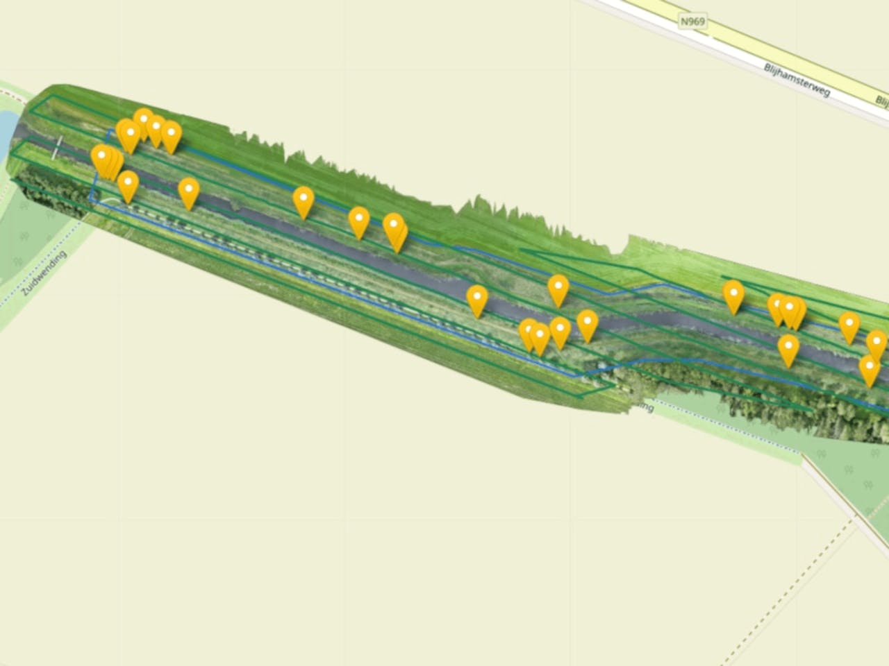 Aerial map with location pins along a road