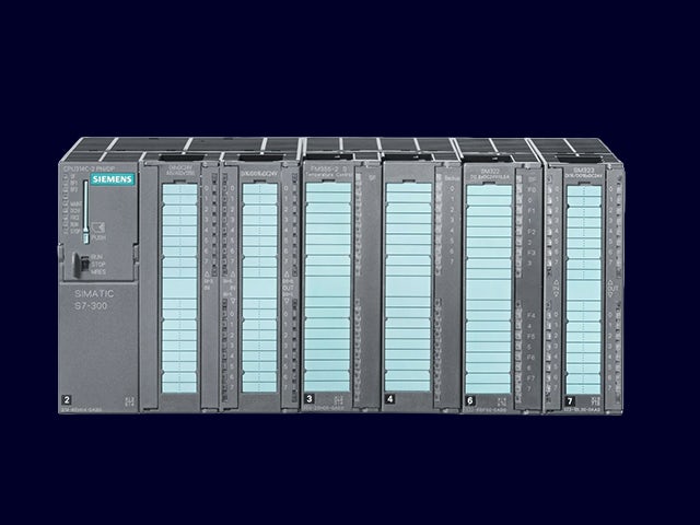 Industrial automation controller with display screen and keypad on blue background