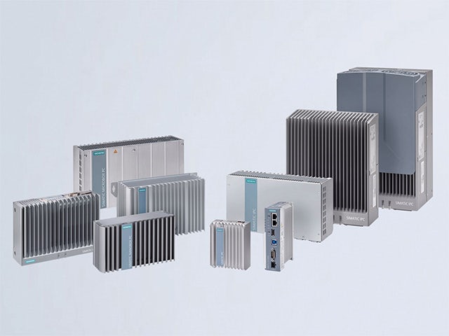 A promotional image of a Simatic Box PC with a sleek design and a screen displaying a user interface.