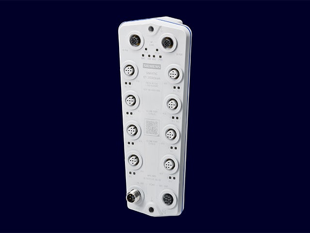 Industrial control panel with blue buttons and digital display on stainless steel surface