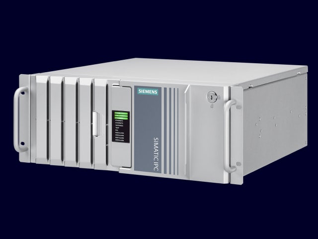 A promotional image of a SIMATIC rack PC IPC RW 545A with a sleek design and a black and white color scheme.
