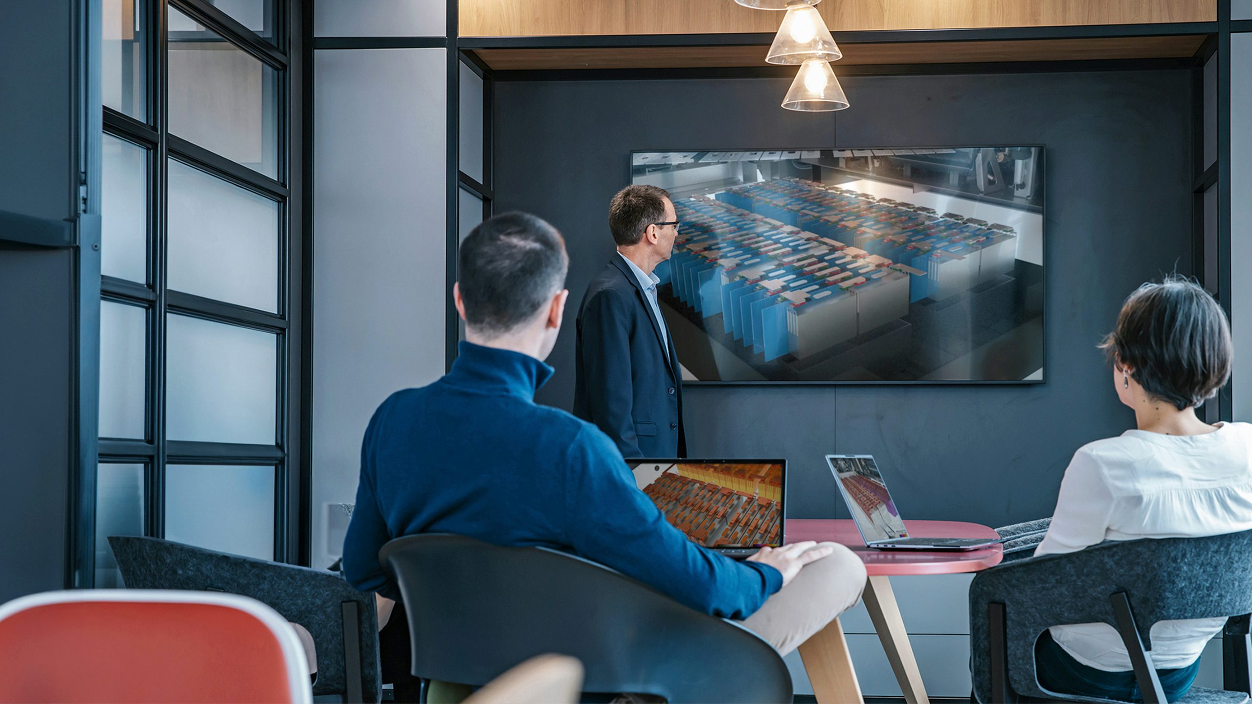 Person wearing VR headset interacting with virtual car design in futuristic workspace