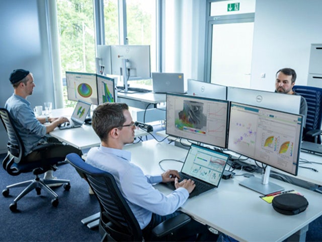 Engineers working in an office using CFD, mechanical, systems simulation and MDAO tools in a unified SaaS environment.