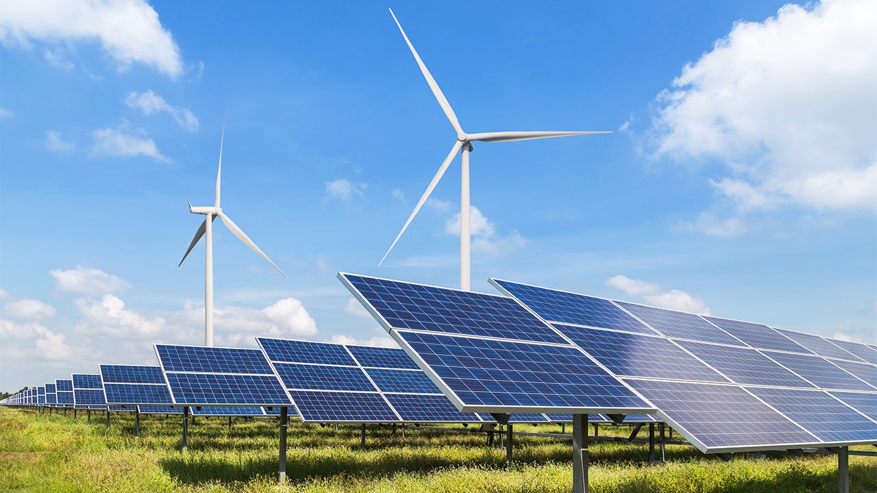 solar-panels-wind-turbines-field-is856798310-1280x720