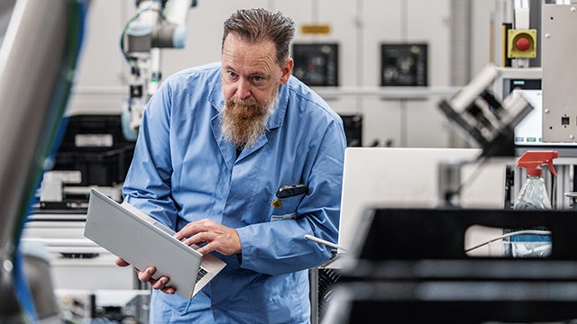 Man working on a computer.