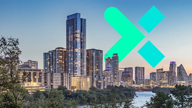 The cover of a white paper featuring buildings and the Siemens Xcelerator logo.